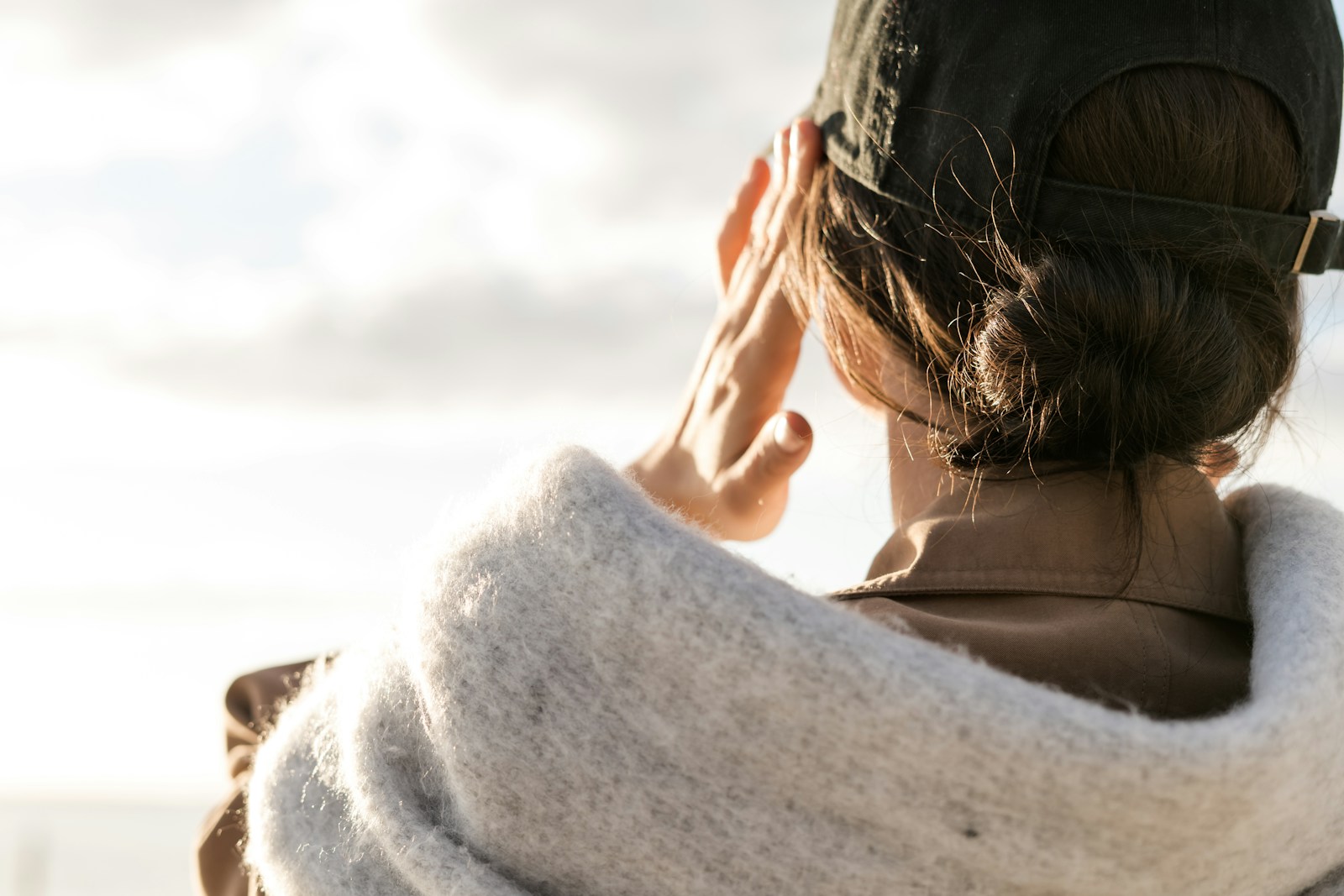 woman in gray scarf